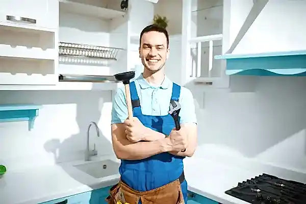 cheerful-male-plumber-holds-wrench-and-plunger-resize.jpg cheerful-male-plumber-holds-wrench-and-plunger-resize.jpg