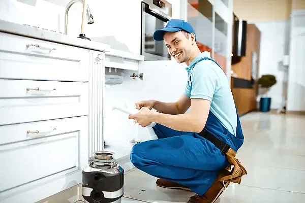 smiling-male-plumber-in-uniform-holds-drain-pipe-resize.jpg smiling-male-plumber-in-uniform-holds-drain-pipe-resize.jpg