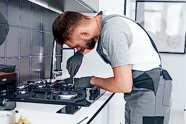 young-professional-plumber-in-grey-uniform-working-resize.jpg young-professional-plumber-in-grey-uniform-working-resize.jpg